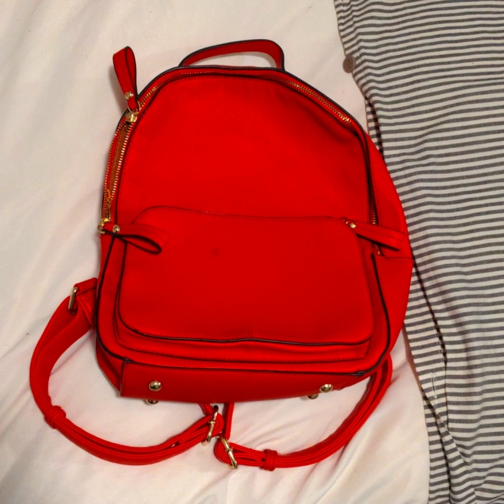Red leather backpack